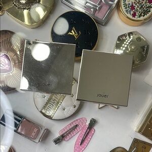 Jouer powder highlighters in shades topaz and rose quartz